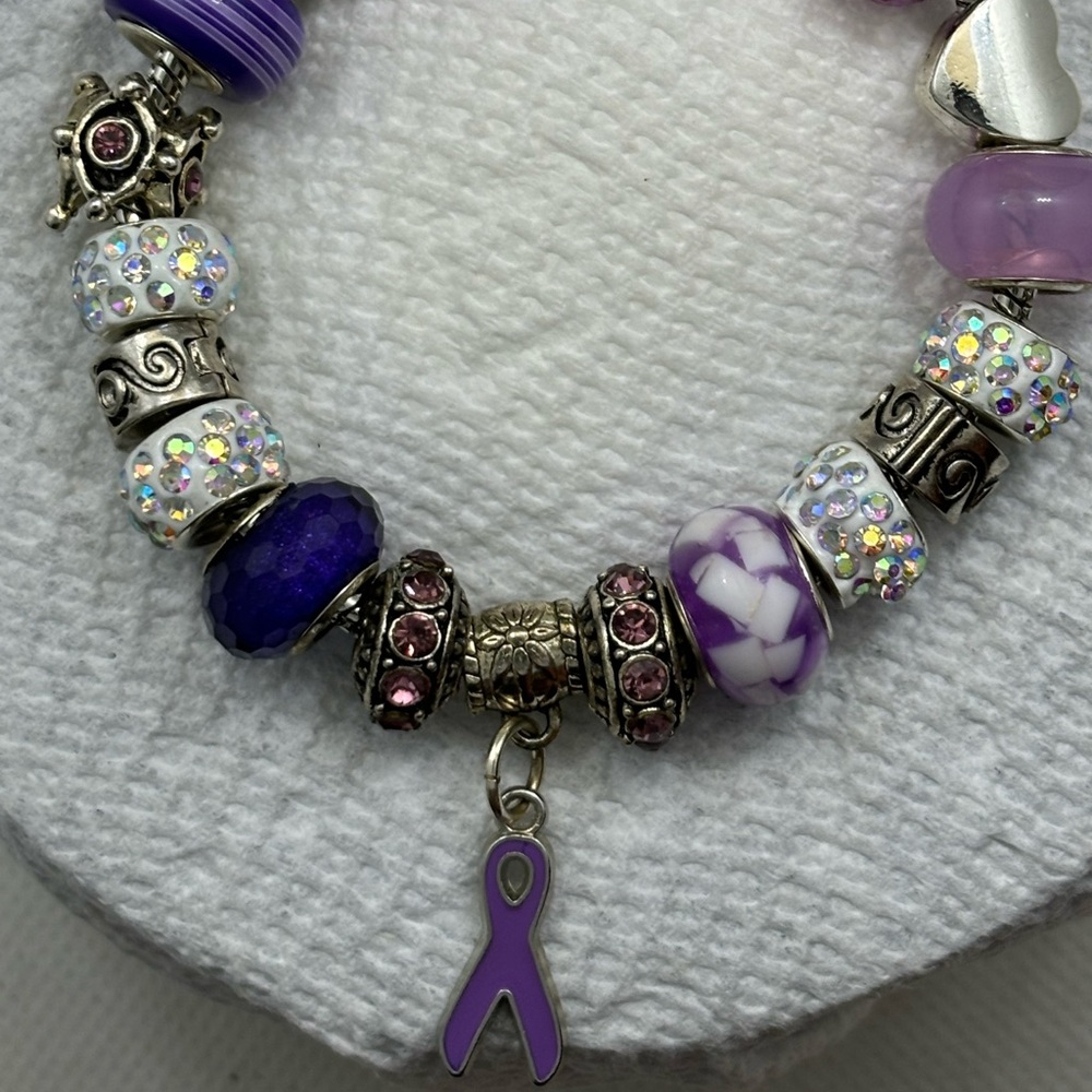 Purple ribbon charm bracelet